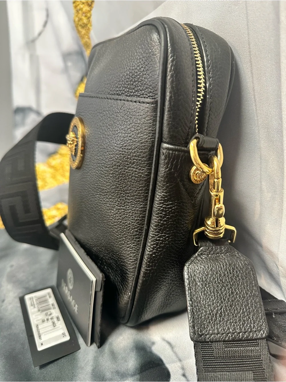 Versace Black Leather Messenger Bag with Gold Medusa Accent